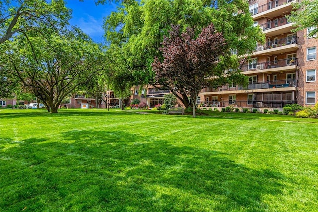 162-01 Powells Cove Blvd Unit 1J, Beechhurst, NY 11357 - view of community featuring a yard