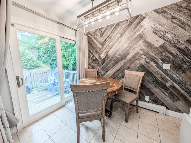 14 Hampton Rd, Sound Beach, NY 11789 - dining area featuring a chandelier and light tile patterned flooring