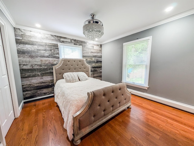 14 Hampton Rd, Sound Beach, NY 11789 - bedroom featuring wood finished floors, ornamental molding, and recessed lighting