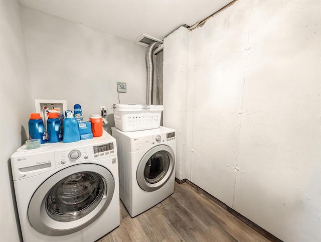 14 Hampton Rd, Sound Beach, NY 11789 - laundry room featuring washer and clothes dryer and wood finished floors