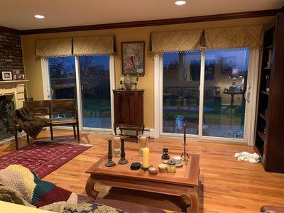 404 Club Ct, Oceanside, NY 11572 - living area featuring wood finished floors, crown molding, and recessed lighting