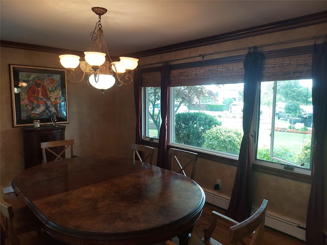 404 Club Ct, Oceanside, NY 11572 - dining room with baseboard heating, a chandelier, and crown molding