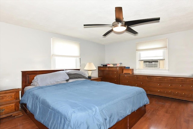 218 Mott St, Oceanside, NY 11572 - bedroom featuring wood finished floors, cooling unit, and ceiling fan
