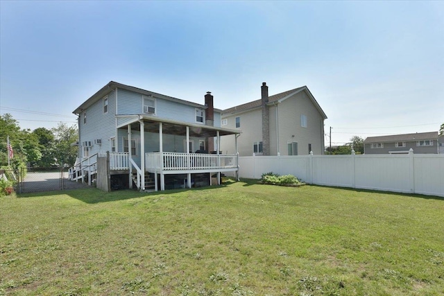 218 Mott St, Oceanside, NY 11572 - rear view of property featuring a fenced backyard, a deck, stairs, and a chimney