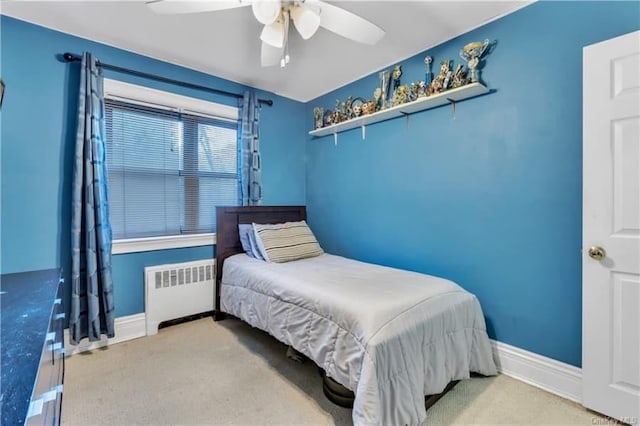 51 White Oak St Unit 2A, New Rochelle, NY 10801 - bedroom with radiator, carpet flooring, and a ceiling fan