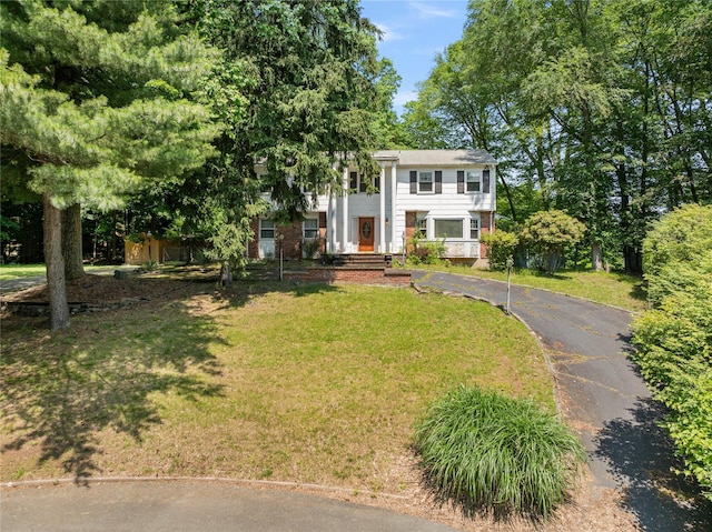 10 Salem Ct, Spring Valley, NY 10977 - neoclassical / greek revival house with a front yard and asphalt driveway