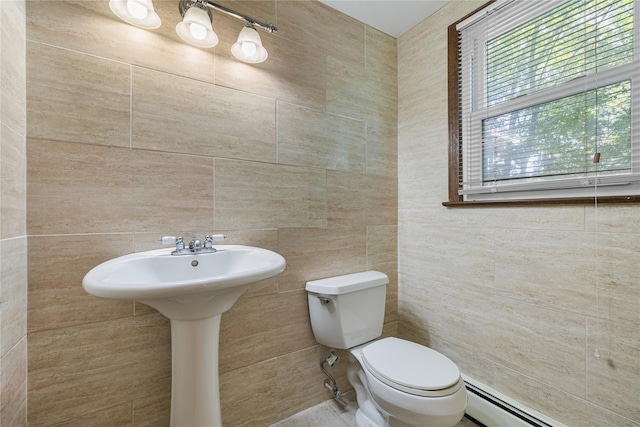 10 Salem Ct, Spring Valley, NY 10977 - half bathroom with a baseboard radiator and tile walls
