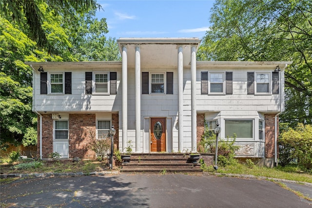 10 Salem Ct, Spring Valley, NY 10977 - greek revival inspired property with brick siding