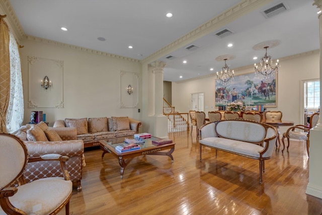 760 Hillcrest Pl, North Woodmere, NY 11581 - living room featuring ornamental molding, light wood finished floors, a chandelier, ornate columns, and recessed lighting