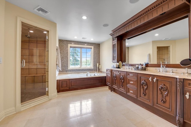 760 Hillcrest Pl, North Woodmere, NY 11581 - bathroom featuring double vanity, a stall shower, a bath, recessed lighting, and tile patterned floors