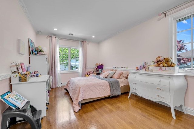 760 Hillcrest Pl, North Woodmere, NY 11581 - bedroom featuring light wood-style flooring and recessed lighting