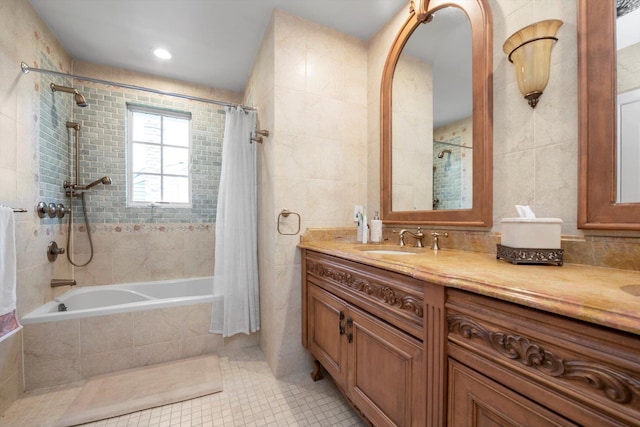 760 Hillcrest Pl, North Woodmere, NY 11581 - full bath with tiled shower / bath combo, vanity, tile patterned floors, and tile walls