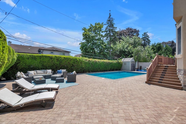 760 Hillcrest Pl, North Woodmere, NY 11581 - view of pool featuring an outdoor living space, a patio area, a shed, stairs, and a fenced backyard