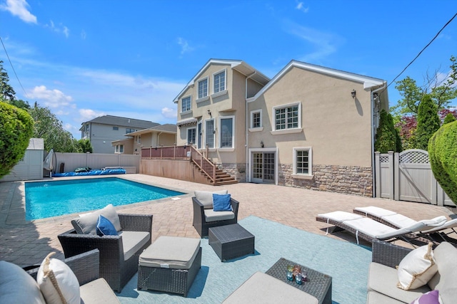 760 Hillcrest Pl, North Woodmere, NY 11581 - view of pool with a gate, a fenced backyard, an outdoor living space, a patio, and stairs