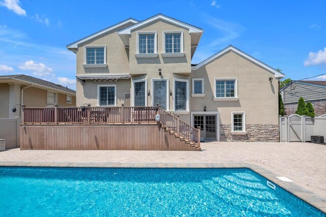 760 Hillcrest Pl, North Woodmere, NY 11581 - swimming pool featuring a gate, a patio, stairs, and a wooden deck