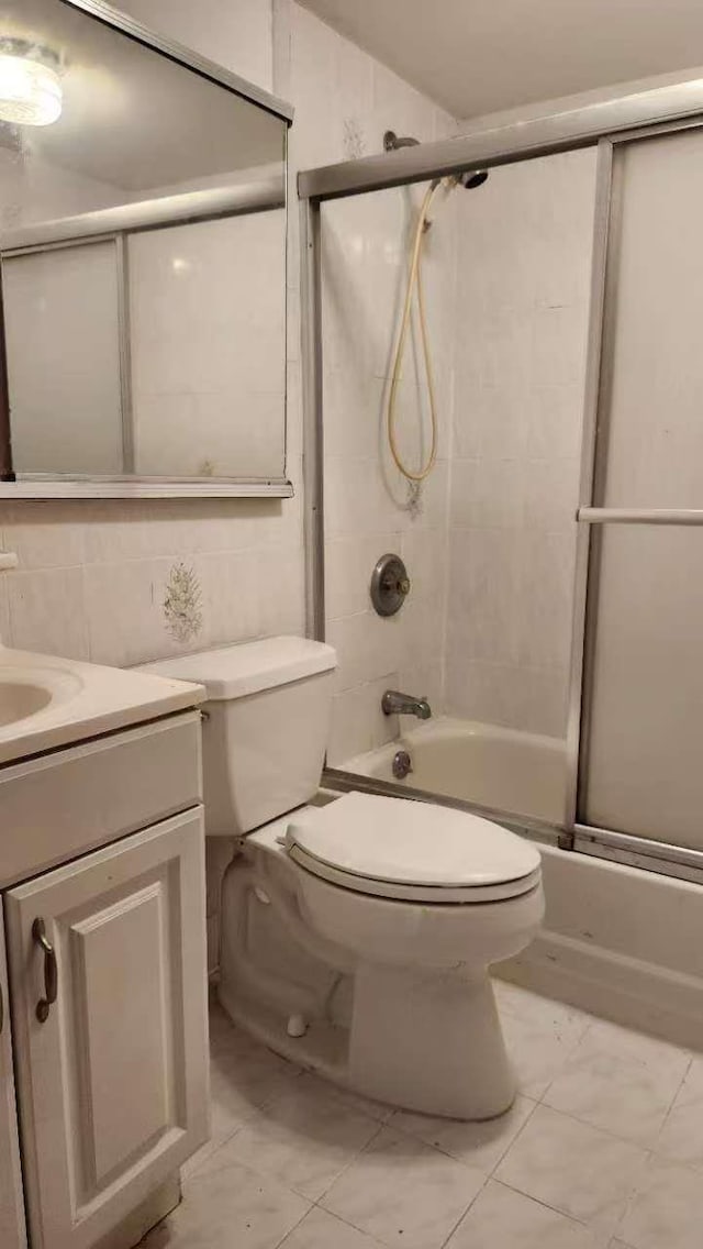222 Capstan Ct Unit 101B, College Point, NY 11356 - bathroom featuring enclosed tub / shower combo and vanity