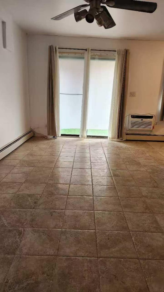 222 Capstan Ct Unit 101B, College Point, NY 11356 - spare room featuring a ceiling fan and a wall mounted air conditioner