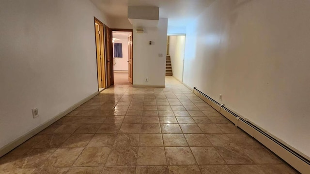222 Capstan Ct Unit 101B, College Point, NY 11356 - hall with a baseboard heating unit, stairway, and a baseboard radiator