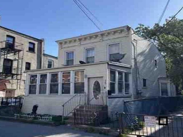 145 Chestnut St, Brooklyn, NY 11208 - italianate house with a sunroom