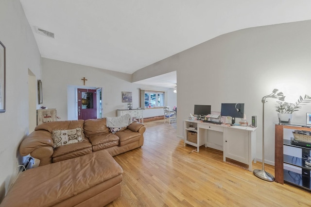 8 Peconic Ln, Selden, NY 11784 - living area featuring lofted ceiling, light wood-style floors, and an office area