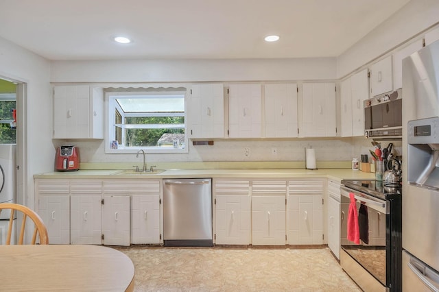 8 Peconic Ln, Selden, NY 11784 - kitchen with appliances with stainless steel finishes, light countertops, white cabinets, recessed lighting, and light flooring