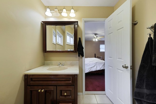 8 Peconic Ln, Selden, NY 11784 - bathroom with vanity, tile patterned flooring, a ceiling fan, and ensuite bath
