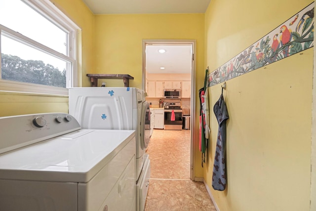 8 Peconic Ln, Selden, NY 11784 - washroom featuring washing machine and dryer