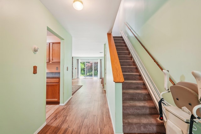 12 Deer Ct Dr, Middletown, NY 10940 - stairs featuring wood finished floors and baseboards