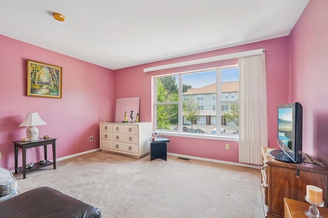 12 Deer Ct Dr, Middletown, NY 10940 - living area featuring carpet floors and baseboards
