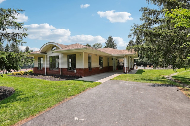 12 Deer Ct Dr, Middletown, NY 10940 - view of front of house featuring asphalt driveway, a front yard, and a carport