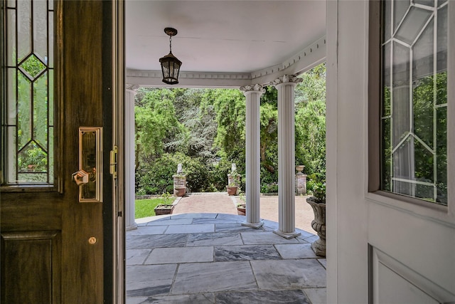 1537 Laurel Hollow Rd, Laurel Hollow, NY 11791 - entrance foyer with stone tile flooring and decorative columns