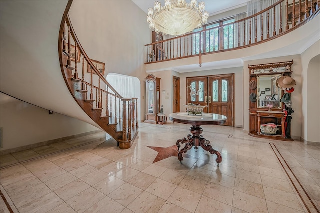 1537 Laurel Hollow Rd, Laurel Hollow, NY 11791 - foyer entrance with a high ceiling, stairs, a chandelier, and arched walkways