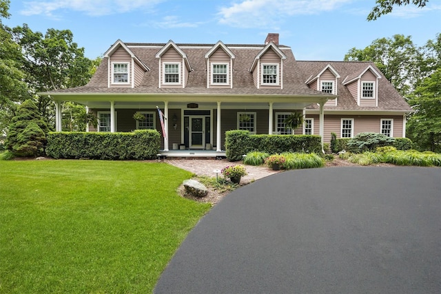 114 Bulsontown Rd, Stony Point, NY 10980 - cape cod home with a front yard, covered porch, a chimney, and a shingled roof