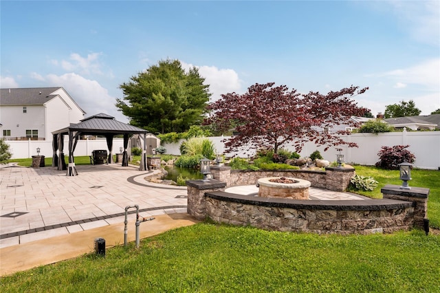 25 Segatogue Ln, South Setauket, NY 11720 - view of yard featuring a gazebo, an outdoor fire pit, and a patio