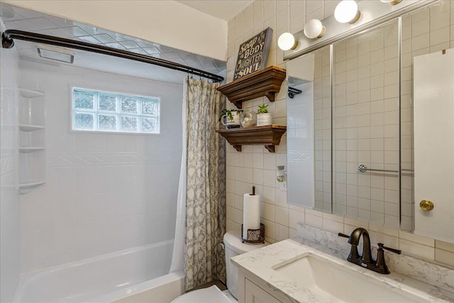 49 Radcliff Ave, Port Washington, NY 11050 - bathroom featuring tile walls, shower / bath combination with curtain, vanity, and decorative backsplash