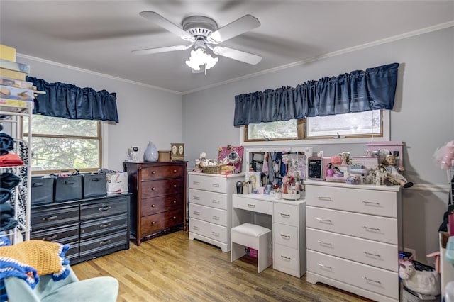 1241 Lednam Ct, Merrick, NY 11566 - bedroom with crown molding, light wood-type flooring, and a ceiling fan
