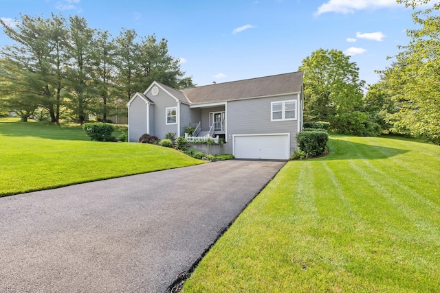 29 Underhill Rd N, Poughquag, NY 12570 - view of front facade featuring driveway, a garage, and a front yard