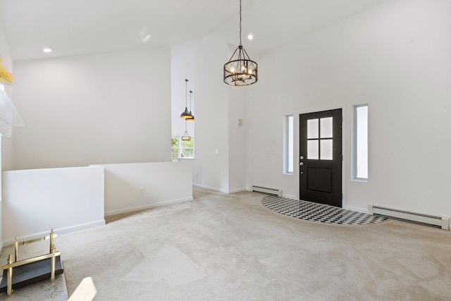 29 Underhill Rd N, Poughquag, NY 12570 - carpeted entrance foyer featuring baseboard heating, a chandelier, high vaulted ceiling, and recessed lighting