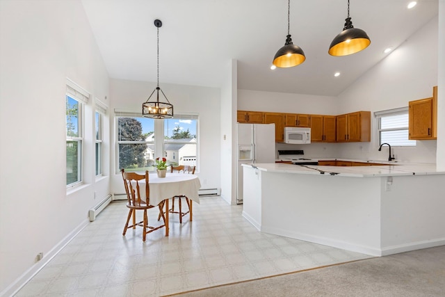 29 Underhill Rd N, Poughquag, NY 12570 - kitchen with white appliances, brown cabinets, baseboard heating, a chandelier, and high vaulted ceiling