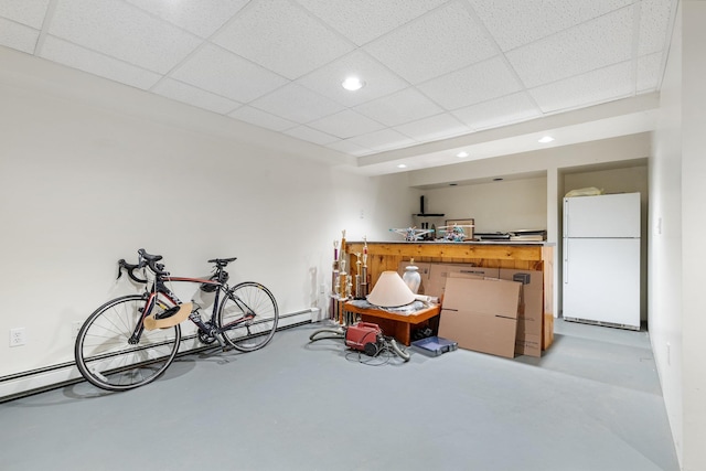 29 Underhill Rd N, Poughquag, NY 12570 - playroom with finished concrete floors, baseboard heating, recessed lighting, and a drop ceiling