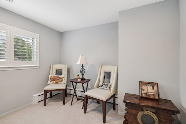 57 Sarah Dr, Lake Grove, NY 11755 - living area featuring carpet and a baseboard radiator