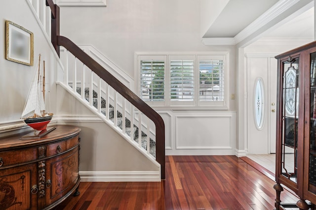 57 Sarah Dr, Lake Grove, NY 11755 - foyer entrance featuring stairway, a decorative wall, wood finished floors, and ornamental molding