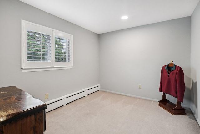 57 Sarah Dr, Lake Grove, NY 11755 - carpeted spare room featuring a baseboard radiator and recessed lighting