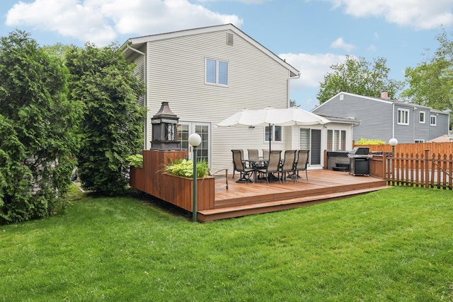 57 Sarah Dr, Lake Grove, NY 11755 - rear view of property featuring outdoor dining area and a wooden deck