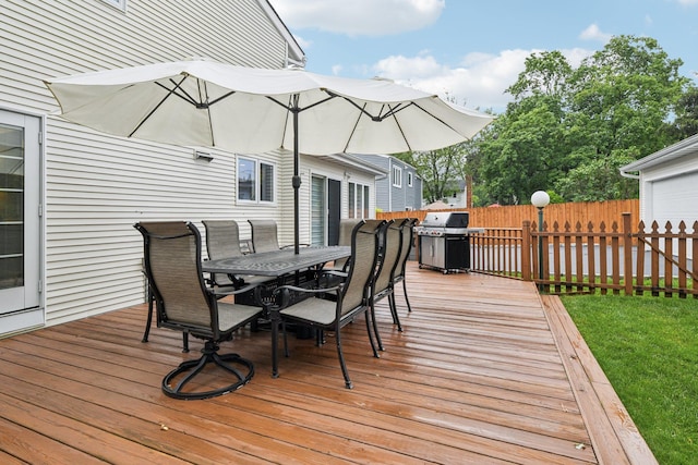 57 Sarah Dr, Lake Grove, NY 11755 - deck with outdoor dining space and a grill