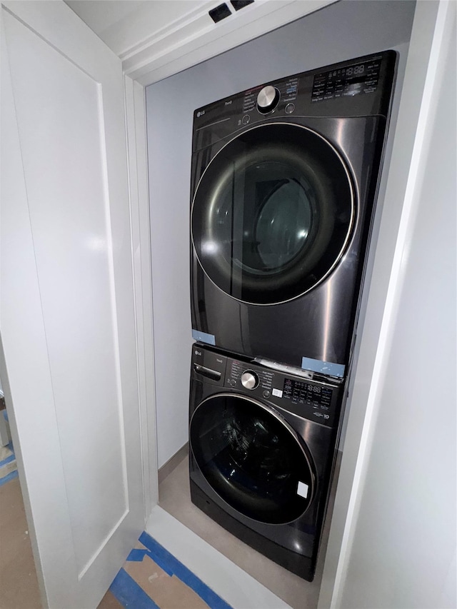 982 E 106th St, Brooklyn, NY 11236 - washroom with stacked washer / drying machine