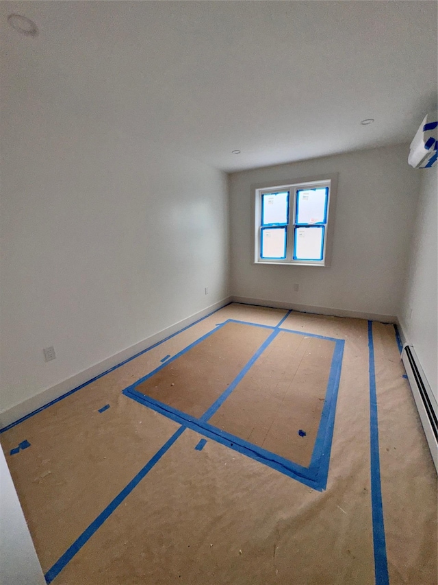 982 E 106th St, Brooklyn, NY 11236 - empty room with a baseboard heating unit and baseboards