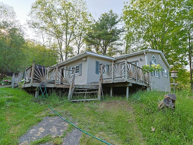 67 Budd Rd, Wurtsboro, NY 12790 - rear view of house with a wooden deck