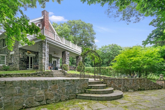 23 Gracemere, Tarrytown, NY 10591 - view of yard with a balcony, ceiling fan, and french doors