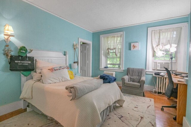 23 Gracemere, Tarrytown, NY 10591 - bedroom with cooling unit, wood finished floors, ornamental molding, and an office area